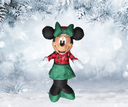 Minnie Mouse inflatable decoration in a winter setting with snow and pine branches.